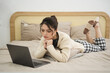 © Q88 - Portrait of beautiful young Asian girl at home
