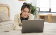 © Q88 - Portrait of beautiful young Asian girl at home