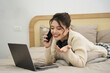 © Q88 - Portrait of beautiful young Asian girl at home