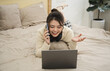 © Q88 - Portrait of beautiful young Asian girl at home