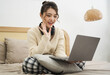 © Q88 - Portrait of beautiful young Asian girl at home