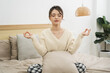 © Q88 - Portrait of beautiful young Asian girl at home