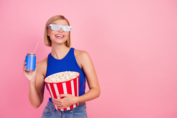 Canvas Print - Photo of pretty young woman 3d glasses movie pop corn soda empty space wear blue top isolated on pink color background