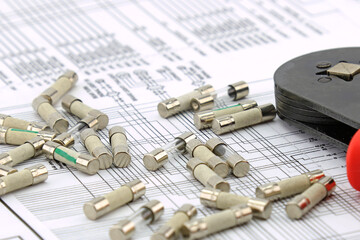 Wall Mural - Fuses for protection of electrical loads on an electronic diagram. Close-up.