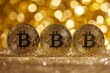 Gold bitcoins on bokeh background
