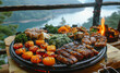 Grilled meat and vegetables on picnic table