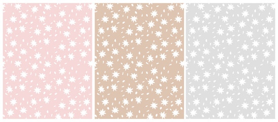 Wall Mural - set of 4 seamless patterns with white stars. irregular hand drawn simple starry print. infantile dra