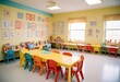 © Uzzi1001 - A school classroom with colorful chairs and tables for children