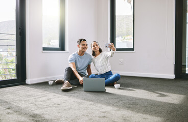 Wall Mural - Selfie, happy or couple on laptop in new house in real estate, property investment or buying apartment. Social media, photo or man on floor with smile, love or woman to celebrate moving in empty flat