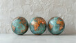 Vintage Globes on a Rustic White Textured Background