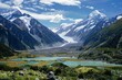 © Maelgoa - A glacier-carved valley with emerald glacial lakes nestled between snow-capped peaks