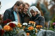 © furyon - grieving family at outdoor funeral mourning loss of loved one at cemetery