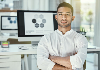 Poster - Businessman, portrait and arms crossed in office with computer screen for research, analysis and project. Male developer, software and technology in workplace for review, media and website at desk