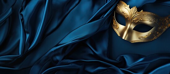 Aufkleber - Blue silk fabric with a magnificent gold carnival mask placed strategically leaving ample copy space image