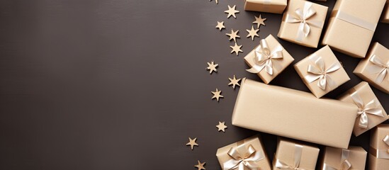 Poster - Craft paper boxes top view on a Christmas background with a right sided copy space image