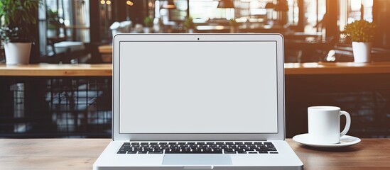 Poster - A blank screen workspace with a laptop on a table providing ample space for adding images or text