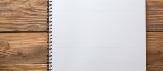 Poster - A wooden background with a blank notebook and a pencil offering ample space for writing or drawing