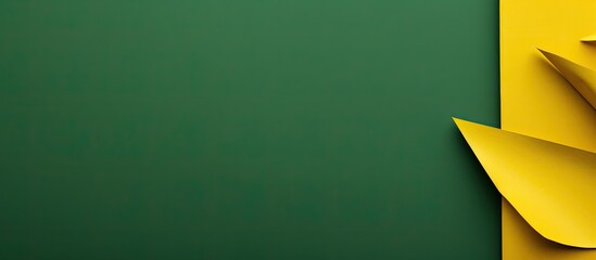 Fototapete - Top view of a vibrant green and yellow paper background with ample copy space for adding images or text