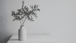© pkproject - Elegant Minimalist Floral Arrangement in White Ceramic Vase on Tabletop