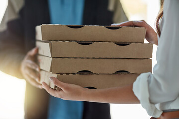 Hands, pizza and woman at front door with delivery man for online shopping, takeout supplier and distribution service. Fast food, courier and customer with cardboard box, sales dinner order in home