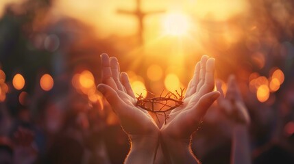 The crown of thorns held in hands with a bright light in the background.