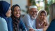 © CosmoJulia - Happy Muslim Family Engaged in Conversation Indoors