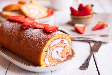 Wall Mural - Swiss roll with strawberries and cream, homemde dessert