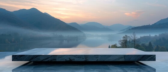 Morning calm on a stone tabletop with a background of misty mountains lit by the first light of sunrise