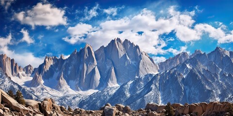 Wall Mural - High peak mountain hill cliff with snow ice on top. Adventure travel nature outdoor scenic background landscape