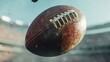 © Sittipol  - A close up of an old, dirty football with a torn up texture.