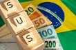 Brazilian healthcare, word SUS meaning unified healthcare system written on wooden cubes. Symbols of Brazil
