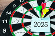 Dart and bull eyes number 2025 New Year concept
