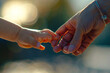 The gentle grip of a childs hand on an adults finger, a plea for guidance, safety, and reassurance in a turbulent world
