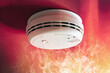 Smoke alarm detector and interlinked fire alarm in action background