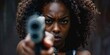 © Jorge Ferreiro - Woman Pointing Gun