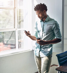 Wall Mural - office, window and black man with phone, coffee and scroll on social media, email or online chat. ne