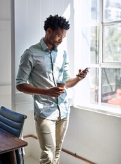 Wall Mural - office, window and black man with phone, coffee cup and scroll on social media, email or online chat