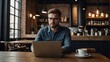 © Tamii - Man, laptop and cafe with remote work, thinking and research or idea for creative writer, Freelance author, technology and coffee shop with email, business and startup project for website article
