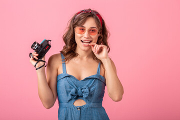 Wall Mural - attractive smiling happy woman posing with vintage photo camera