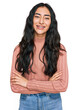 © Krakenimages.com - Hispanic teenager girl with dental braces wearing casual clothes happy face smiling with crossed arms looking at the camera. positive person.