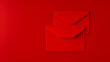 © VISUAL BACKGROUND - Red envelopes on a red background.