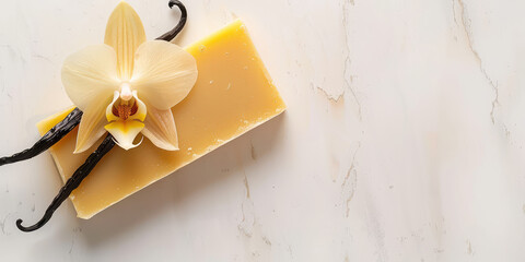 Artisan made natural handmade vanilla soap piece on a white background with vanilla pods and flowers composition in minimal trendy style, copy space. 