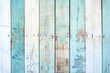 Rustic, weathered wooden boards with peeling light blue paint, showcasing a variety of textures and patterns, ideal for backgrounds or design elements in vintage or shabby chic aesthetics