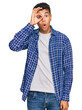 © Krakenimages.com - Young handsome african american man wearing casual clothes doing ok gesture shocked with surprised face, eye looking through fingers. unbelieving expression.