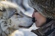 An up-close encounter between a person and a wolf, capturing the essence of mutual respect and understanding