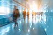 blurred motion of diverse businesspeople walking in office building corridor abstract photo