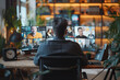 © arthurhidden - Business professional engaged in a virtual meeting from home office