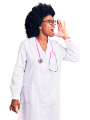 Poster - Young african american woman wearing doctor coat and stethoscope shouting and screaming loud to side with hand on mouth. communication concept.