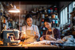 © Nedrofly - Two asian women standing next to a sewing machine, working together on a sewing project.