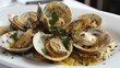 Clam Cuisine: A plate of steamed clams, a delectable seafood dish perfect for any occasion.